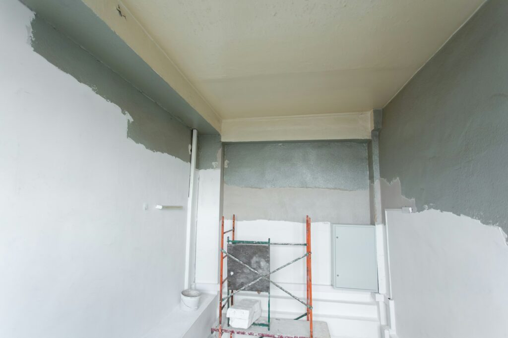 Room with ladders during under renovation, remodeling and construction